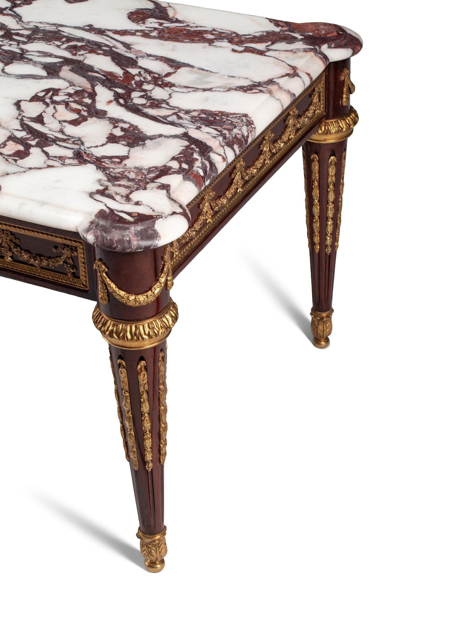 A Louis XVI Style Gilt Bronze Mounted Mahogany Marble-Top Low Table