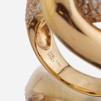 An eighteen karat gold and diamond ring
