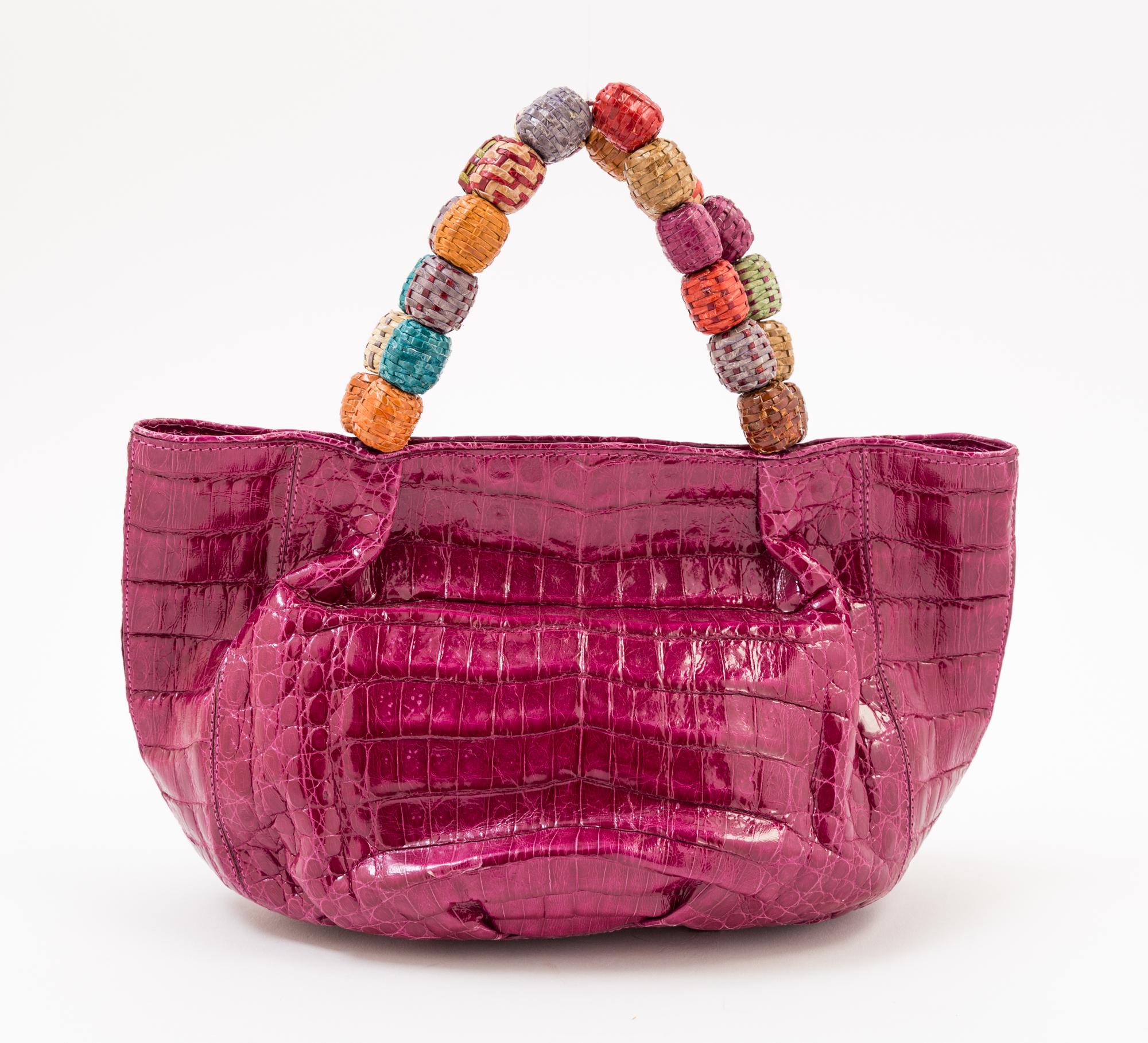 A Nancy Gonzales Fuchsia Crocodile Mini Handbag, 10.25" x 6" x 4.5." Strap drop: 3.5."