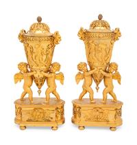 A Pair of Empire Ormolu Vases and Covers