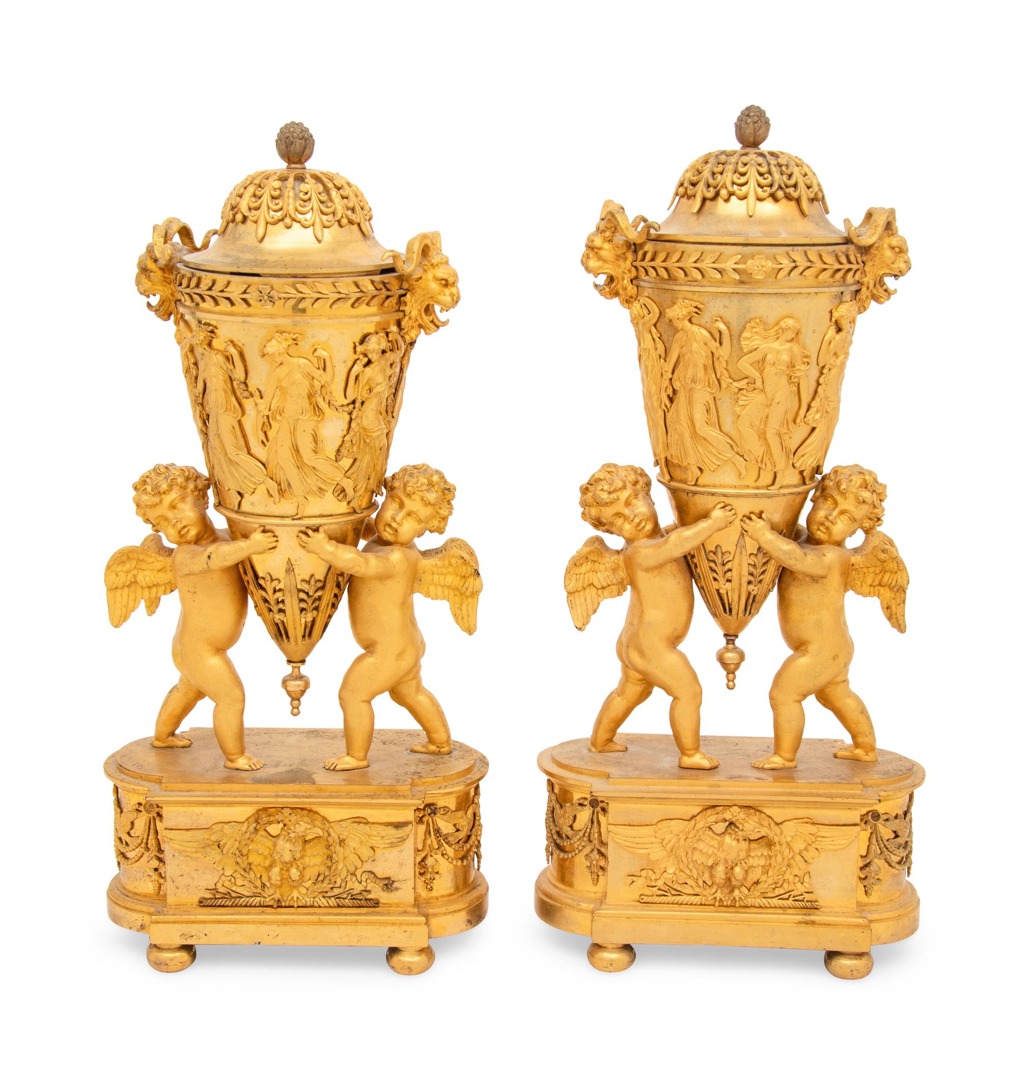 A Pair of Empire Ormolu Vases and Covers