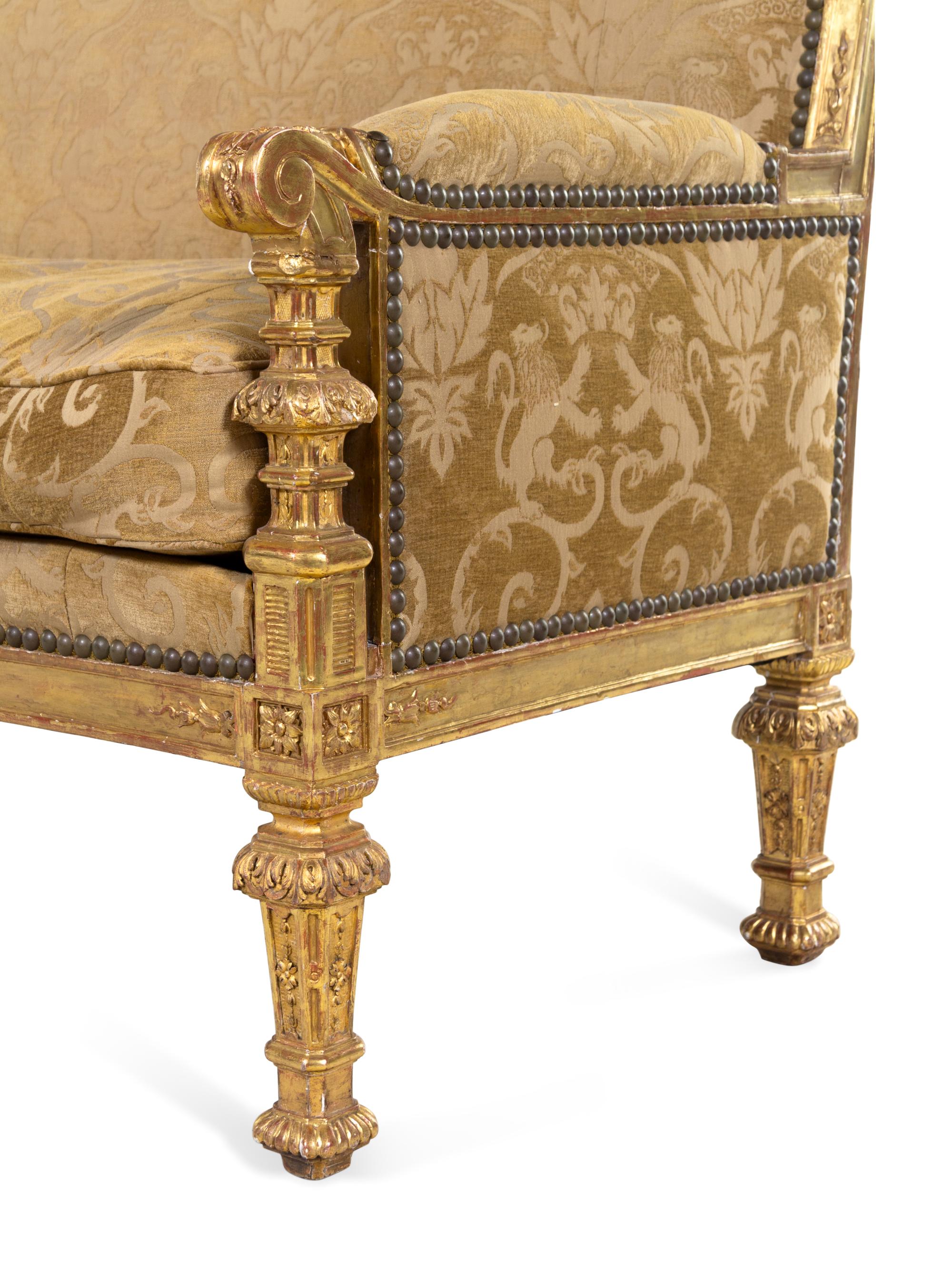 A Pair of Régence Style Carved Giltwood Sofas