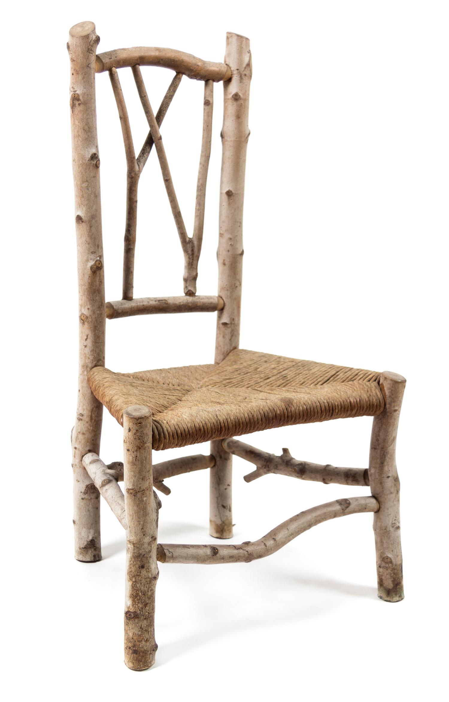 A Twig and Rush Seat Child's Chair Height 28 inches. — 20TH CENTURY