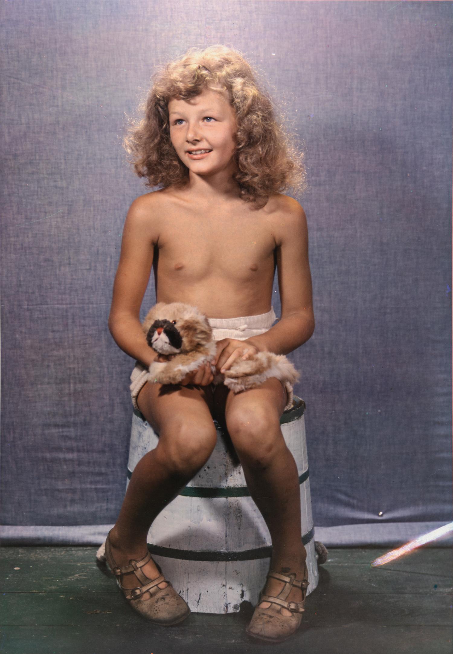 Paul Outerbridge Jr. (1896-1958) Girl with Toy Dog, 1938