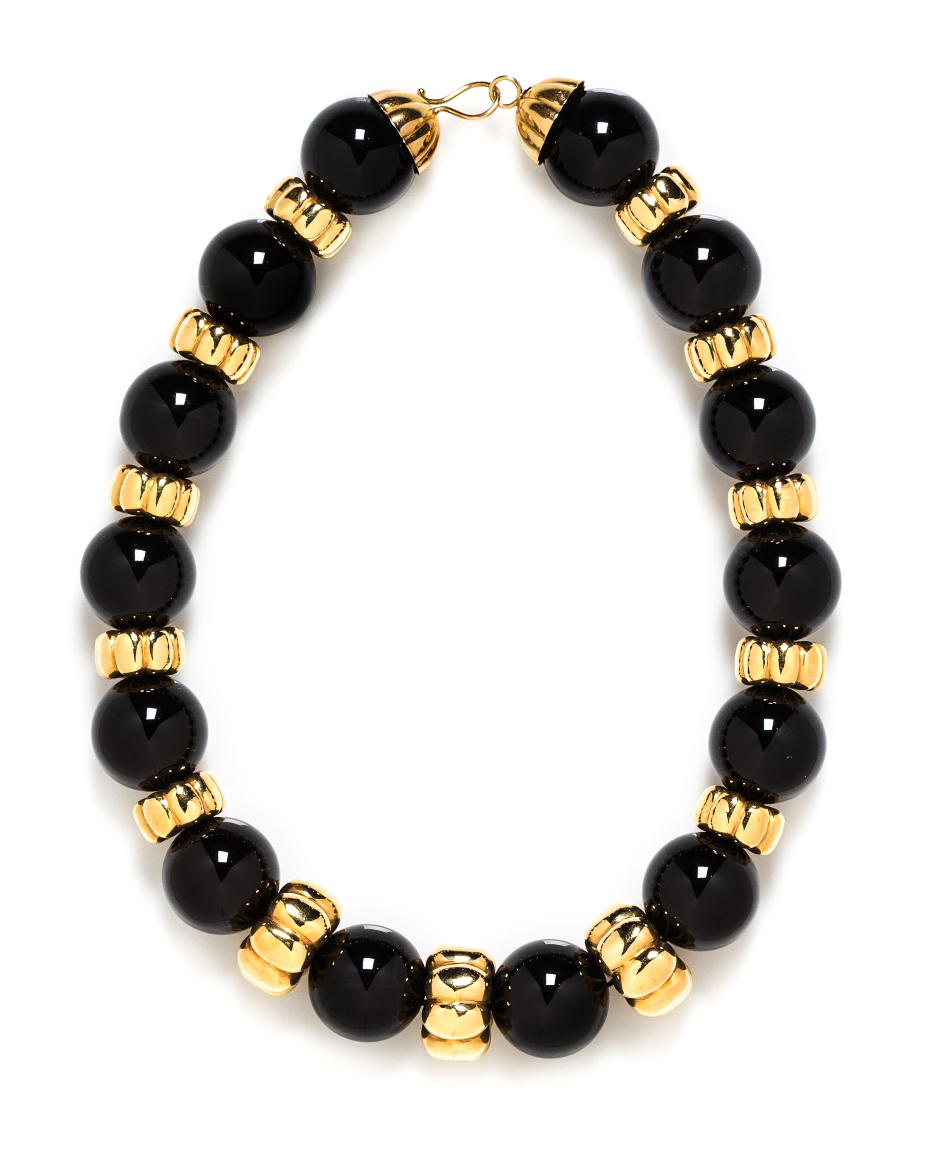 An 18 Karat Yellow Gold and Onyx Bead Necklace, 120.28 dwts.