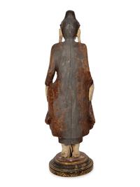 An Indonesian Carved and Painted Figure of a Buddhist Monk