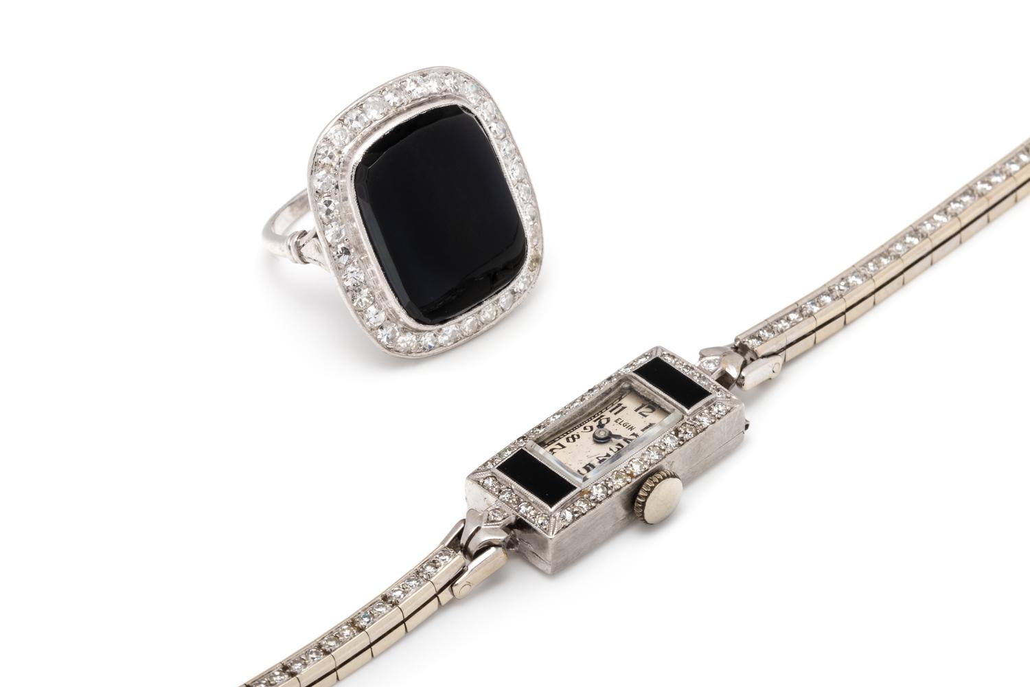 COLLECTION OF WHITE GOLD, PLATINUM, ONYX AND DIAMOND JEWELRY