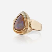 An opal, diamond, and gold ring