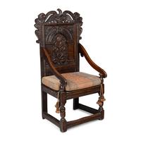 A Charles II Carved Oak Joined Armchair