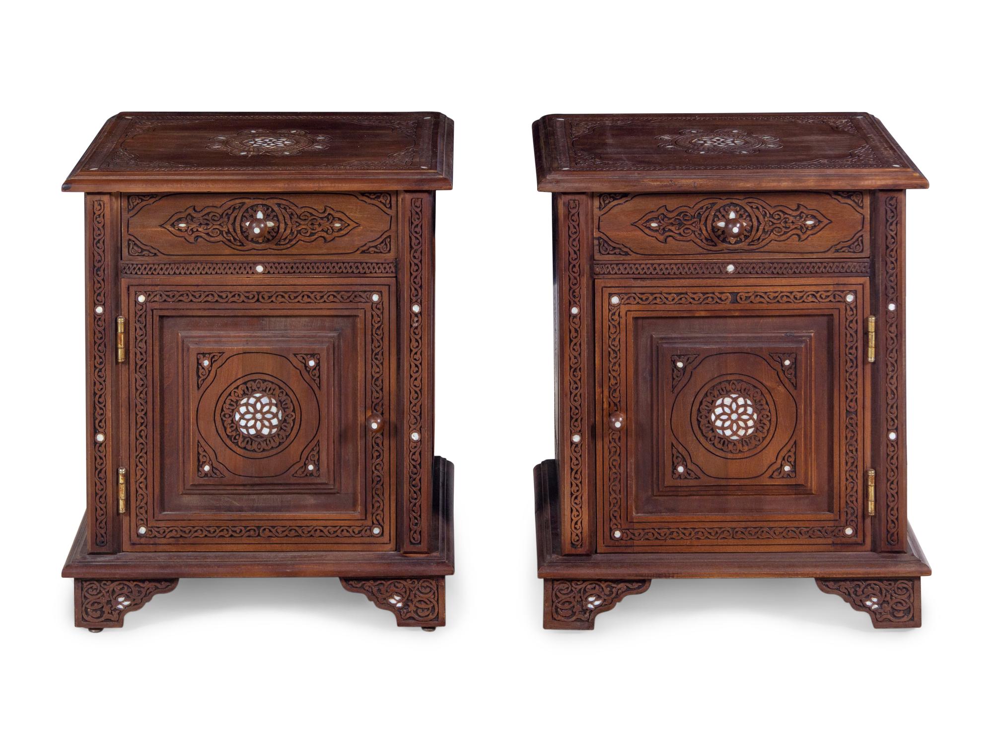 A Pair of Syrian Carved and Mother-of-Pearl Inlaid Walnut Night Tables