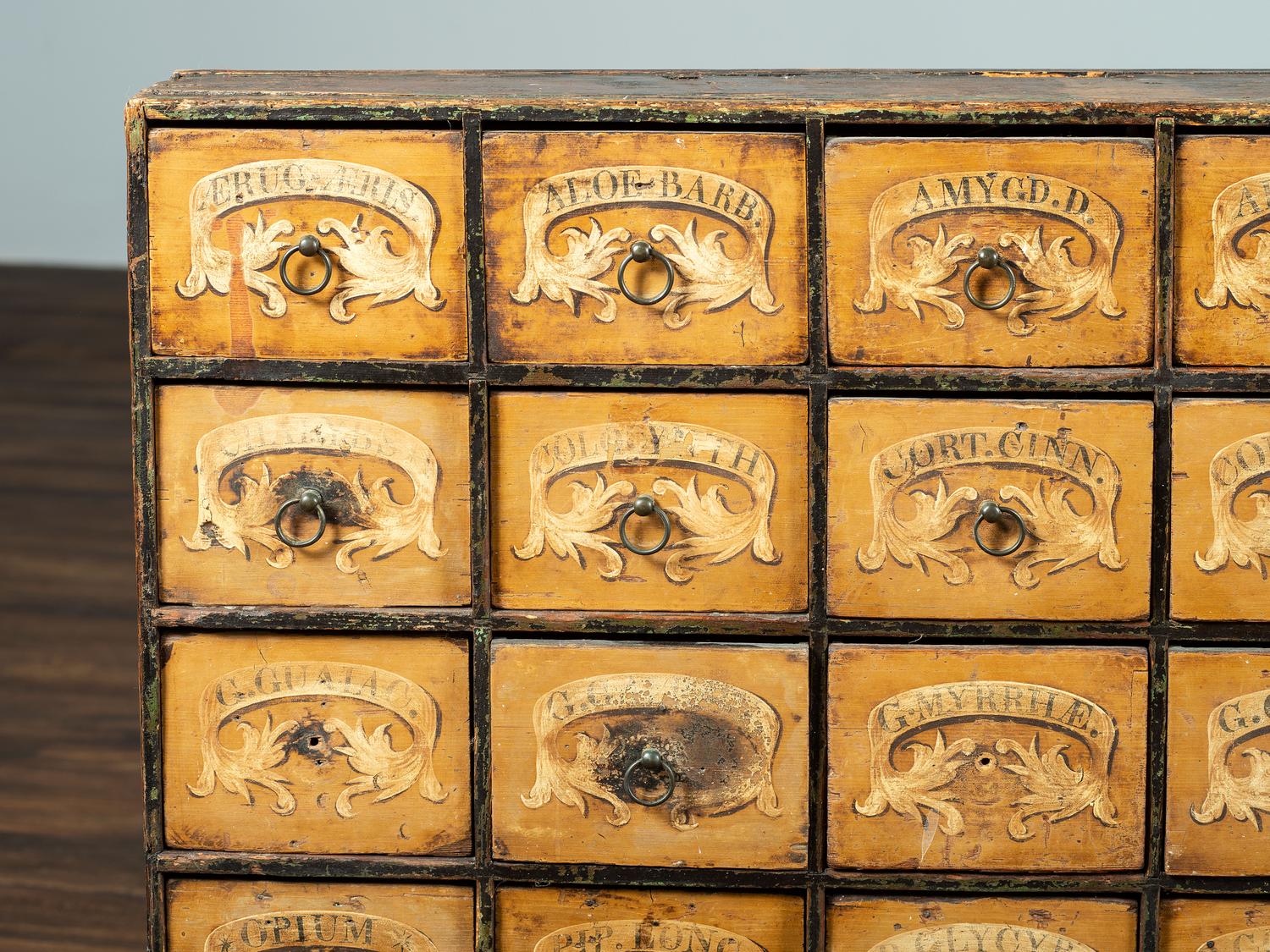 A Country Paint Decorated Apothecary Cabinet
