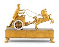 An Empire Gilt Bronze Figural Mantel Clock