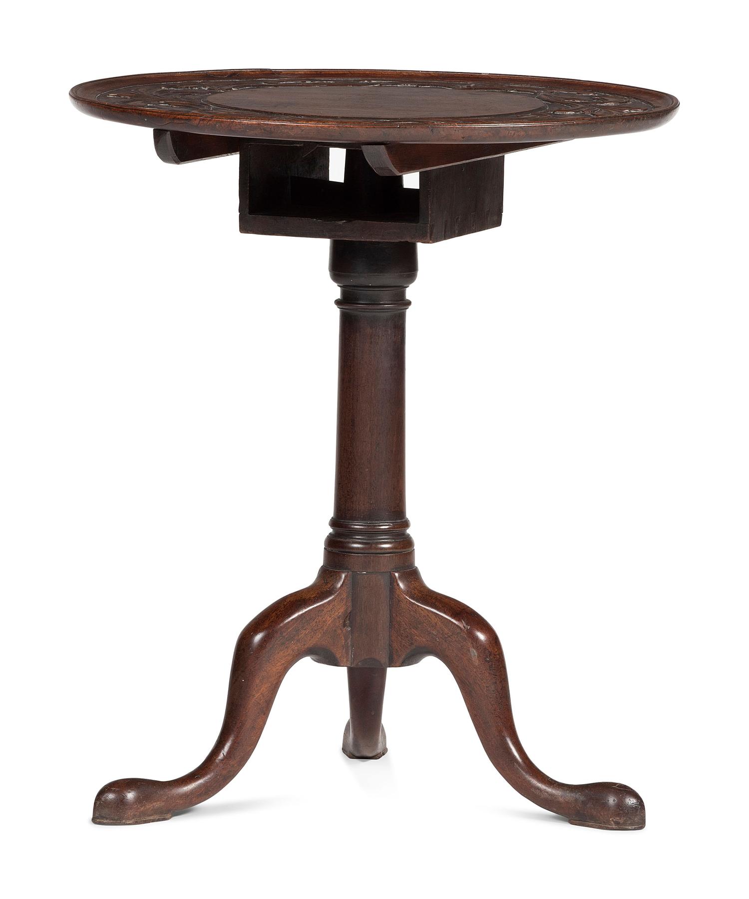 A Carved Walnut Dished-Top Tea Table