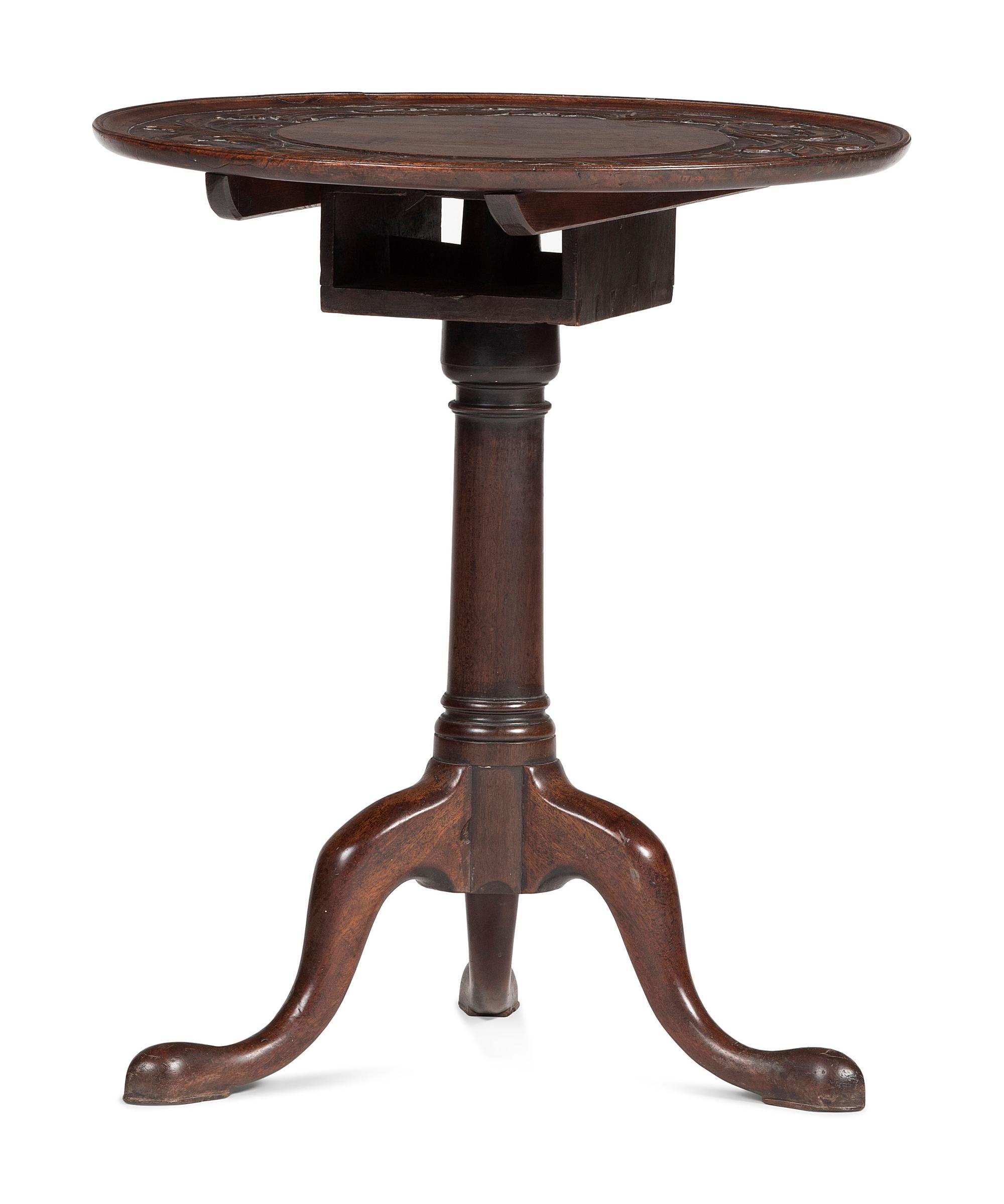 A Carved Walnut Dished-Top Tea Table