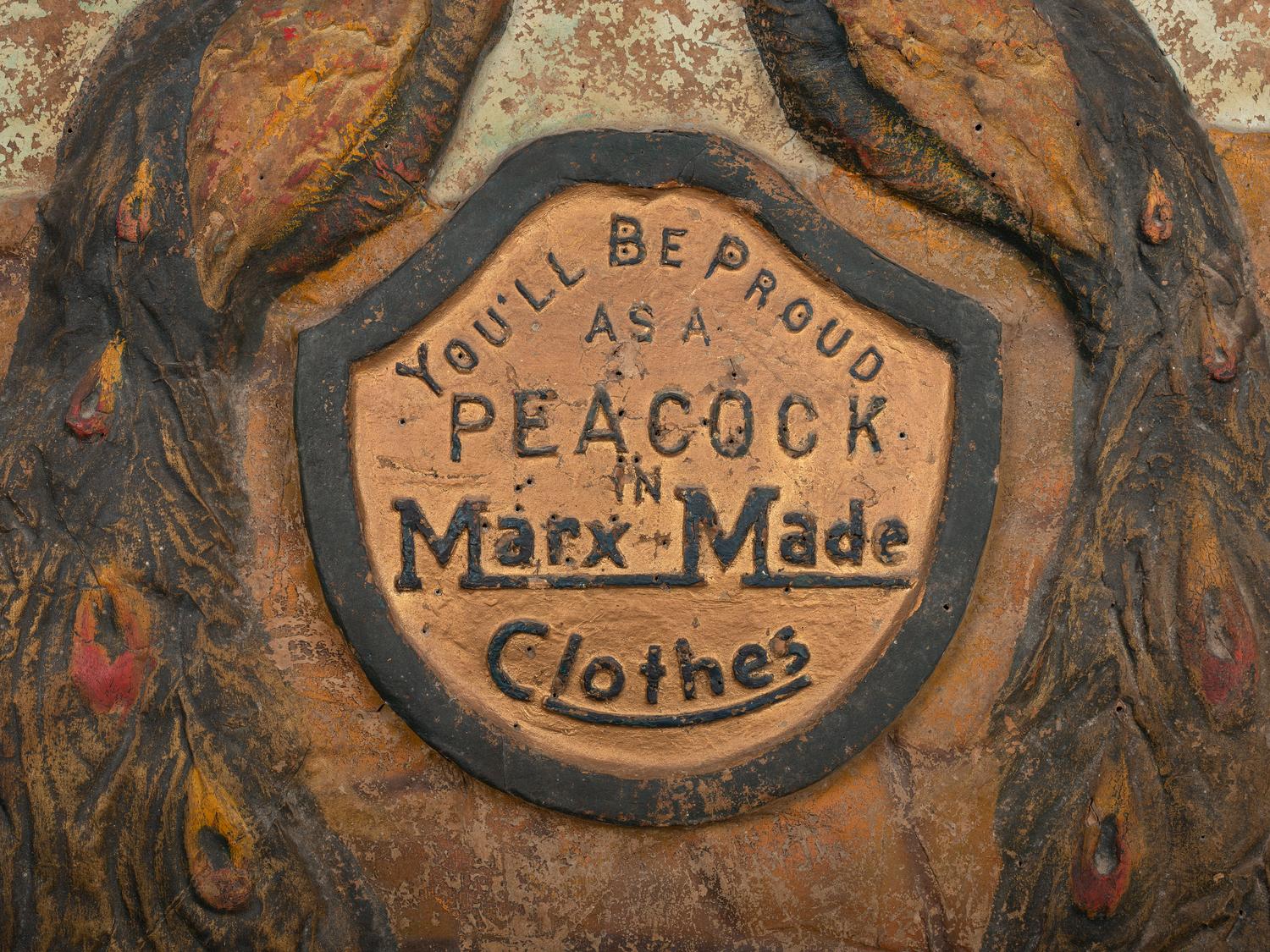 A 'Marx-Made' Clothes Peacock-Decorated Papier-Mache Advertising Sign