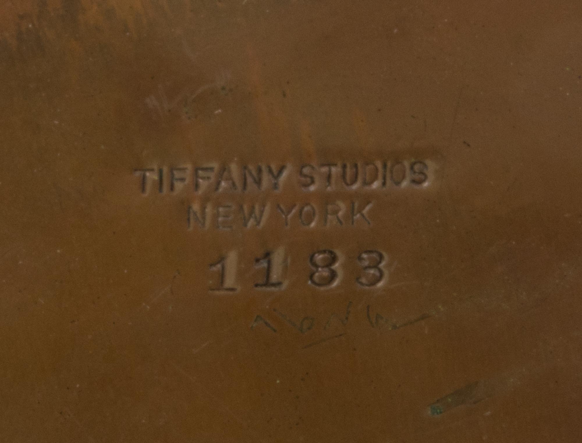 Tiffany Studios, EARLY 20TH CENTURY, an American Indian pattern bronze inkwell, (1183)