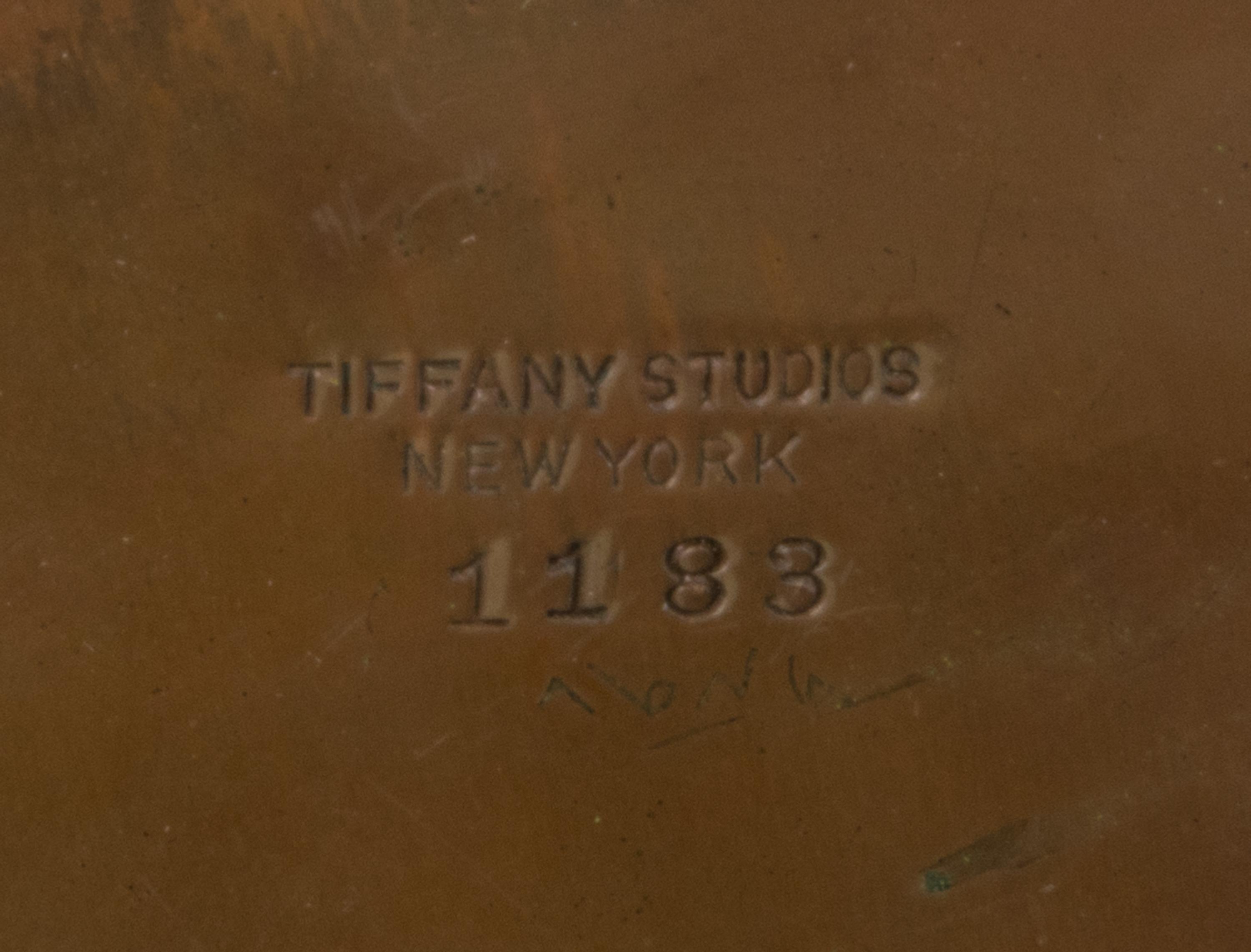 Tiffany Studios, EARLY 20TH CENTURY, an American Indian pattern bronze inkwell, (1183)