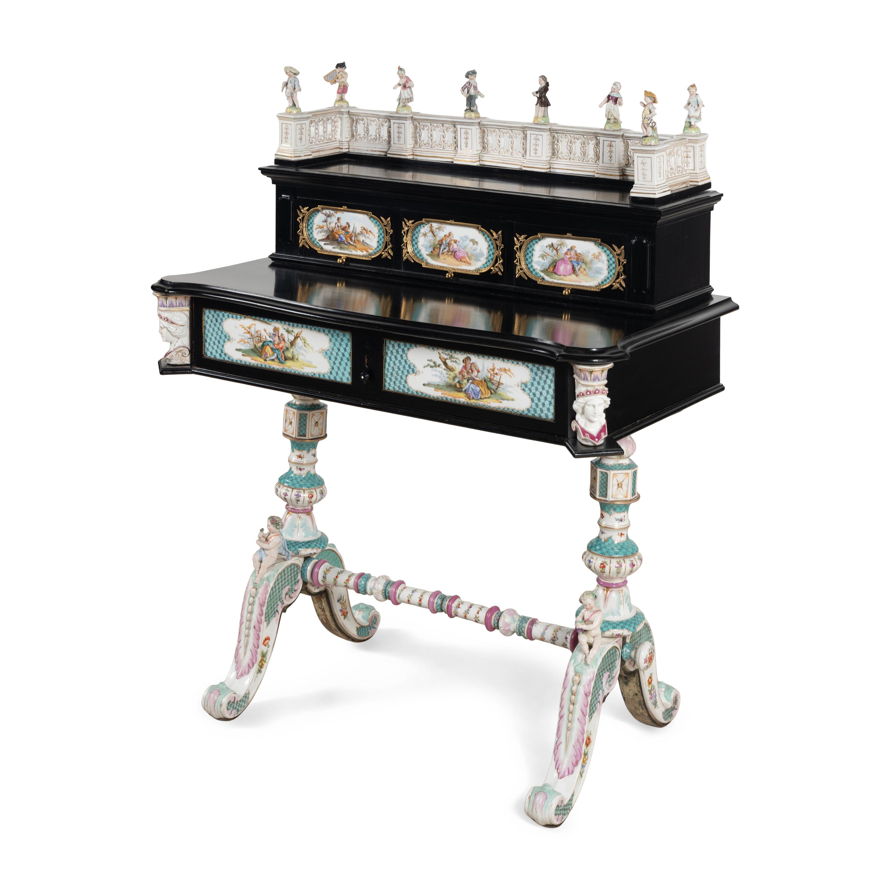 A German Ebonized and Porcelain Mounted Bureau
