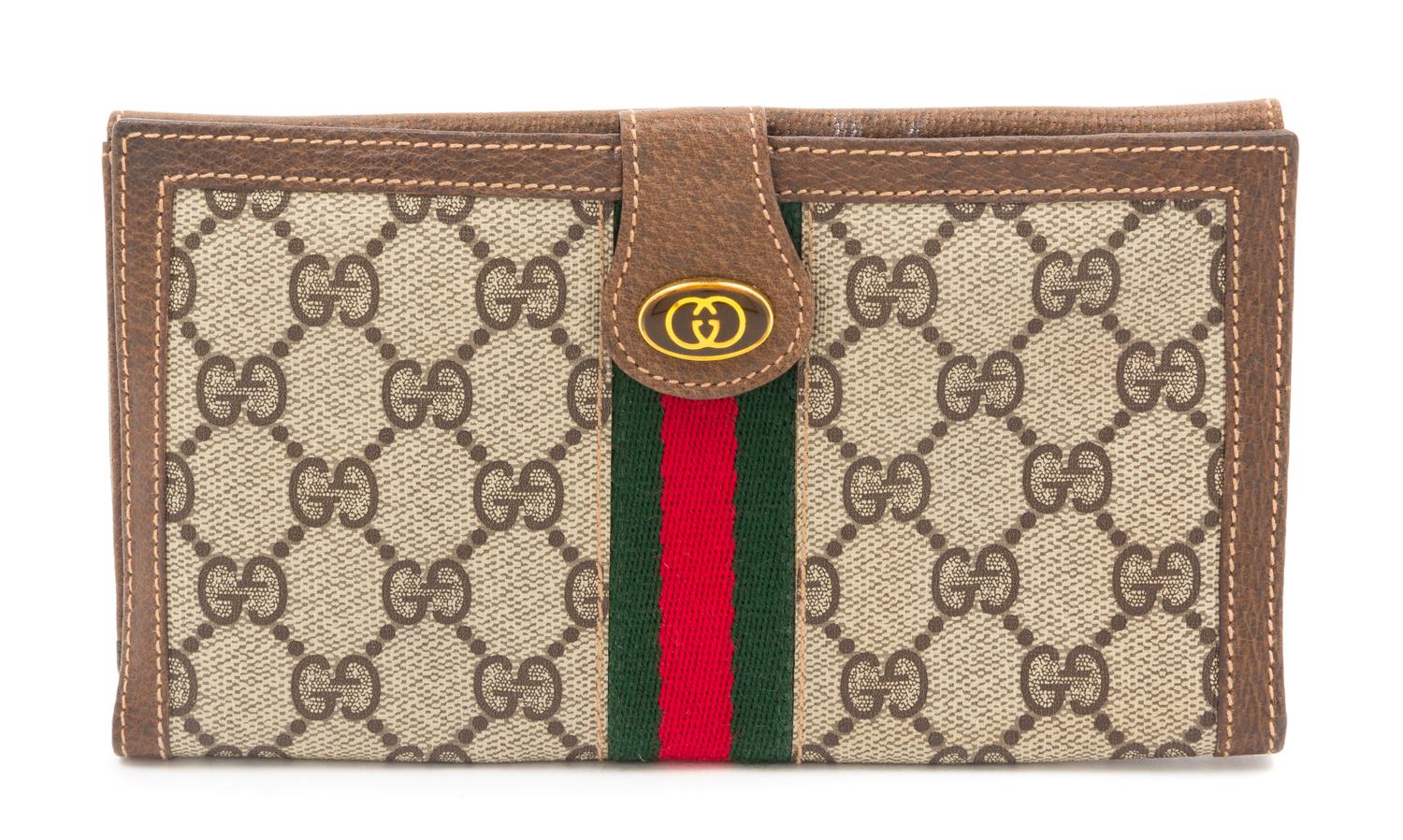 A Gucci Monogram Canvas Wallet, 7.5" x 4.5".