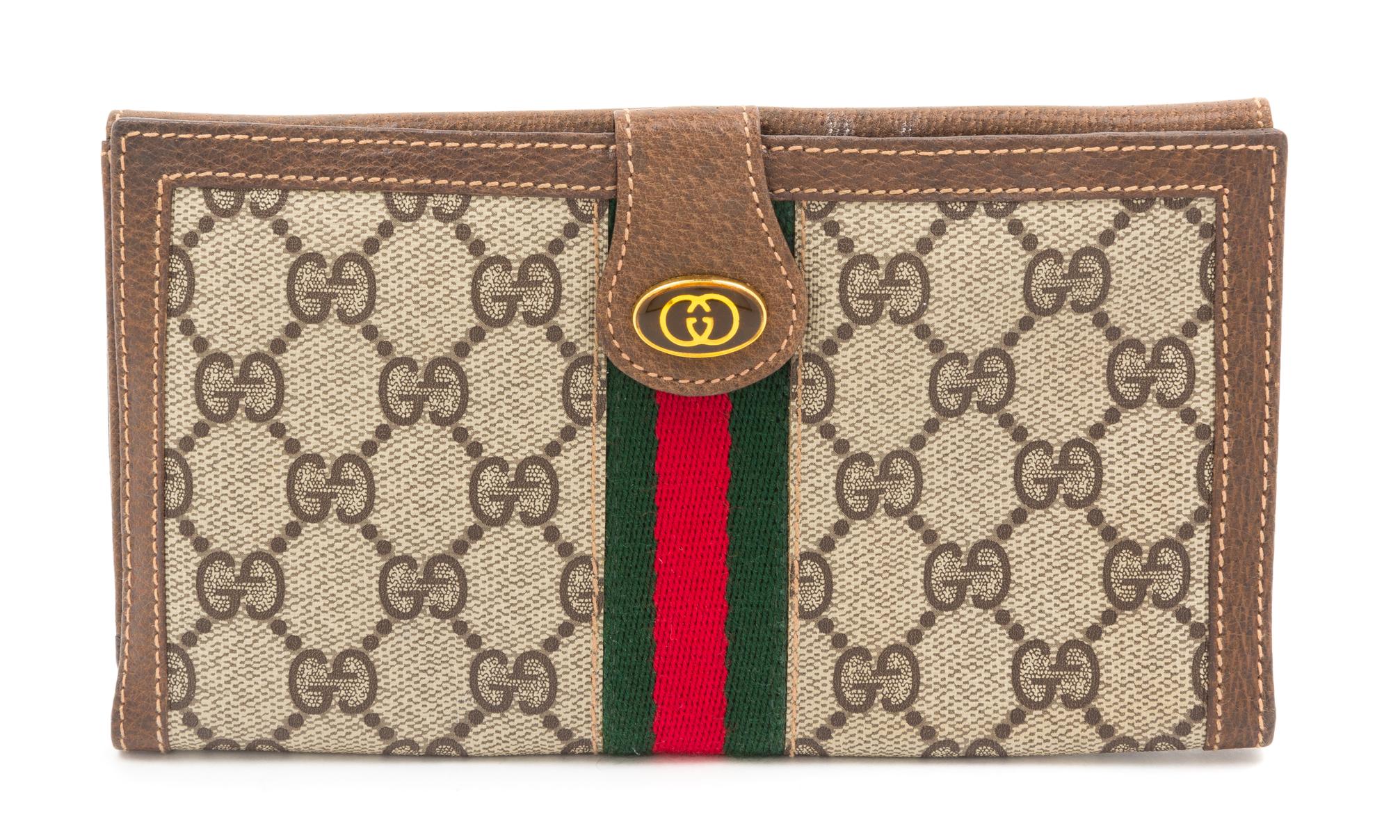 A Gucci Monogram Canvas Wallet, 7.5" x 4.5".