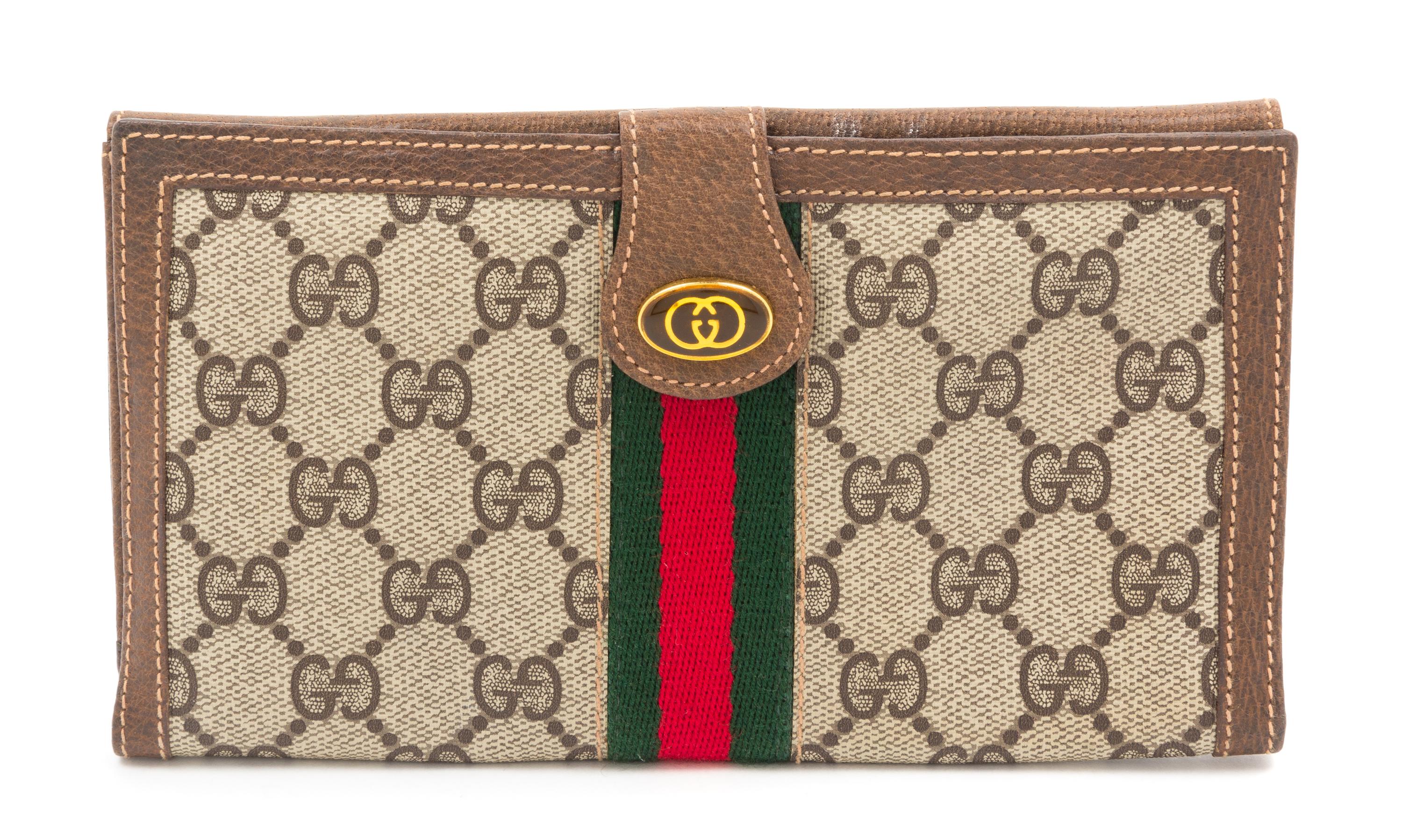 A Gucci Monogram Canvas Wallet, 7.5" x 4.5".
