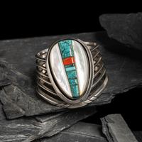 Victor Beck (Diné, 1941-2022) — Turquoise, Coral, and Mother of Pearl Silver Cuff Bracelet