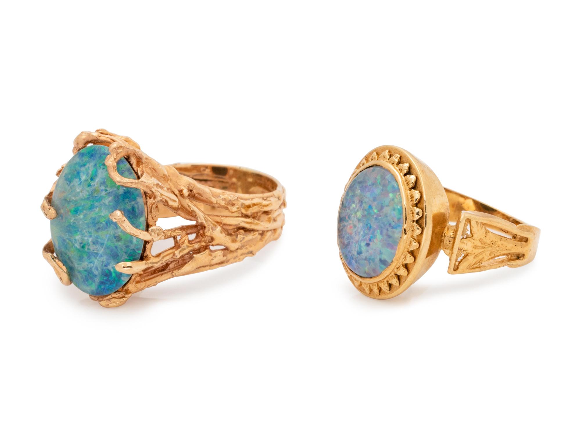 A Collection of 14 Karat Yellow Gold and Opal Doublet Rings,
