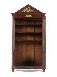 An Empire Style Gilt Metal Mounted Mahogany Bookcase