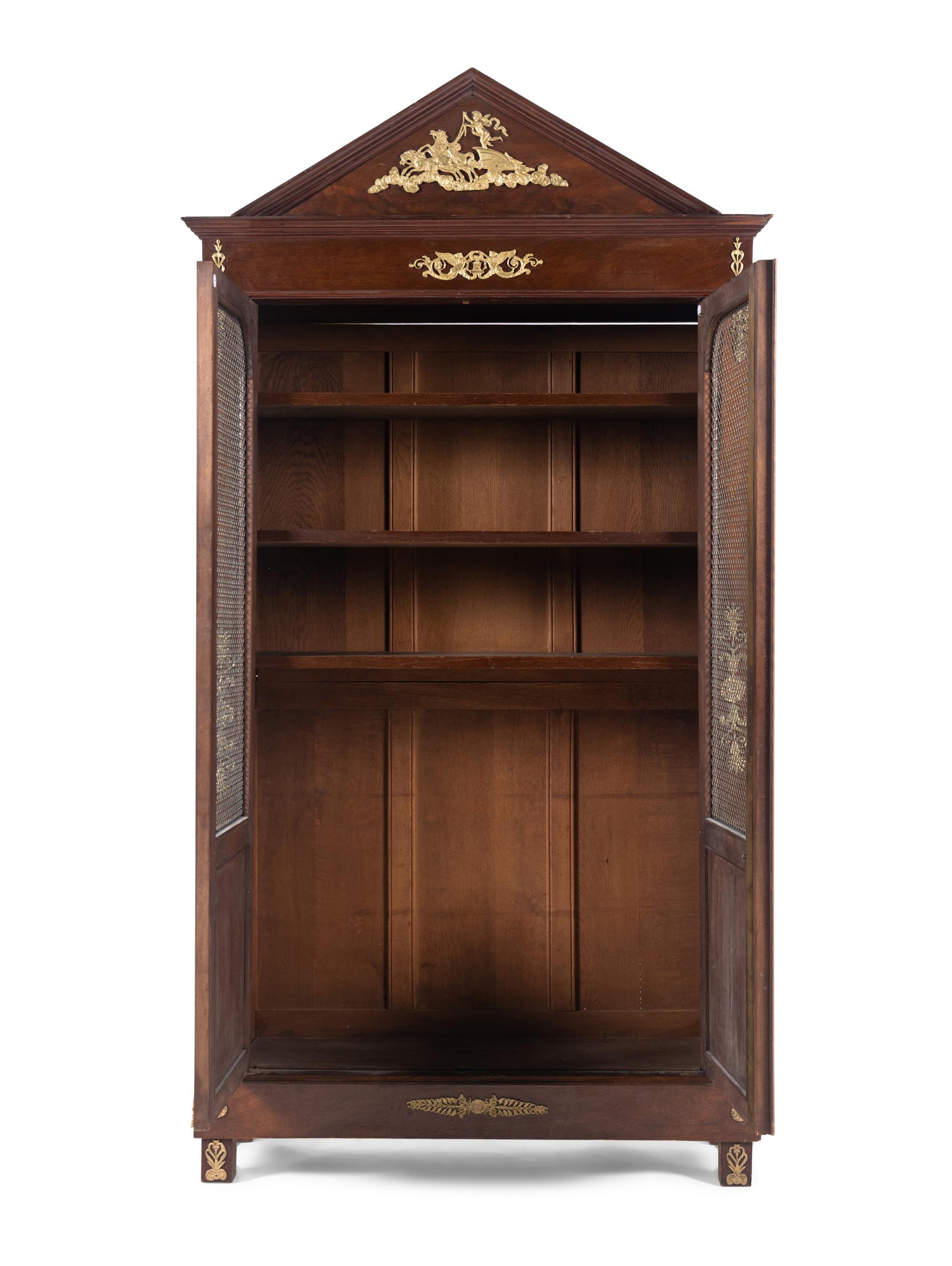 An Empire Style Gilt Metal Mounted Mahogany Bookcase