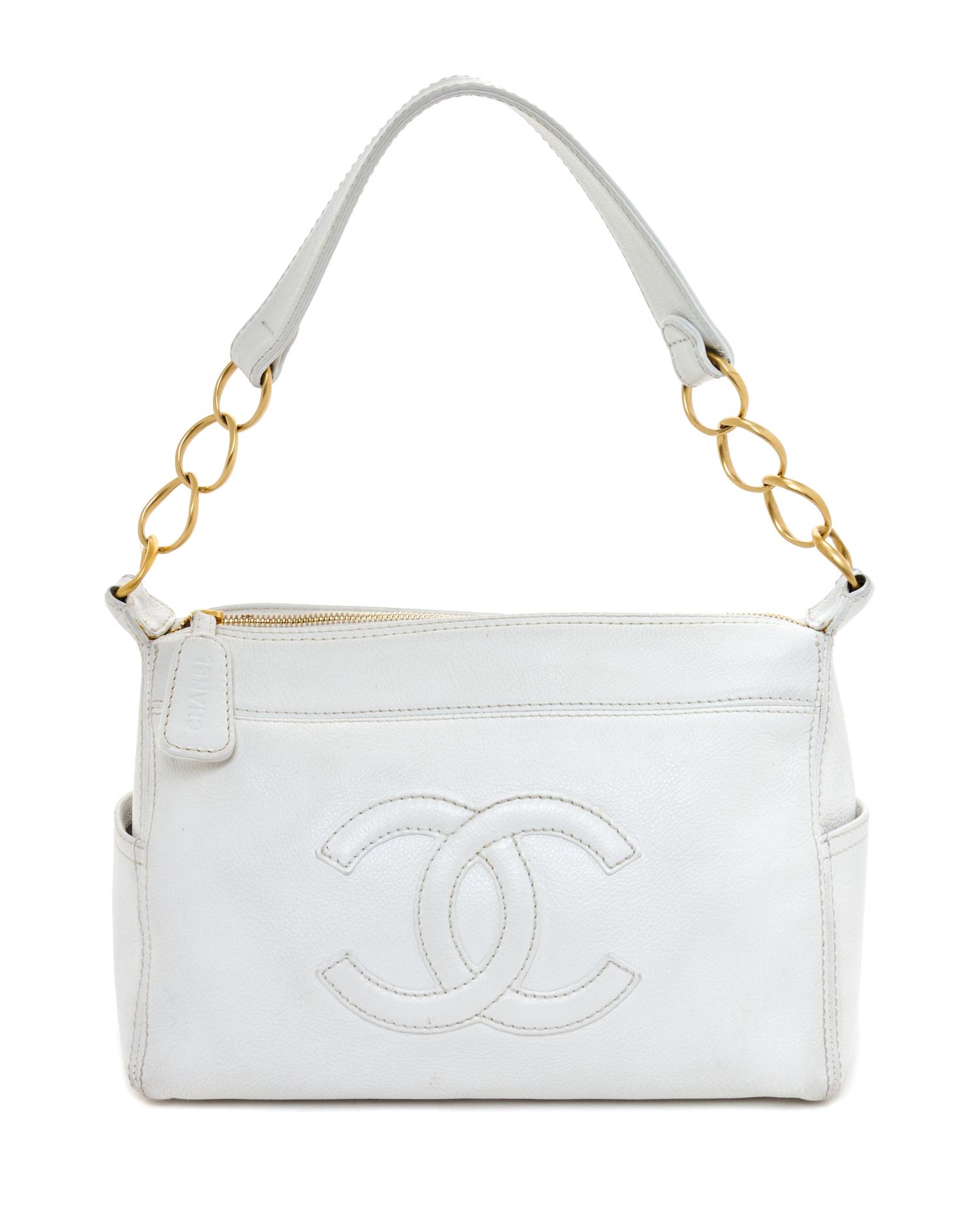 A Chanel White Caviar Leather Handbag, 14" x 8" x 5".