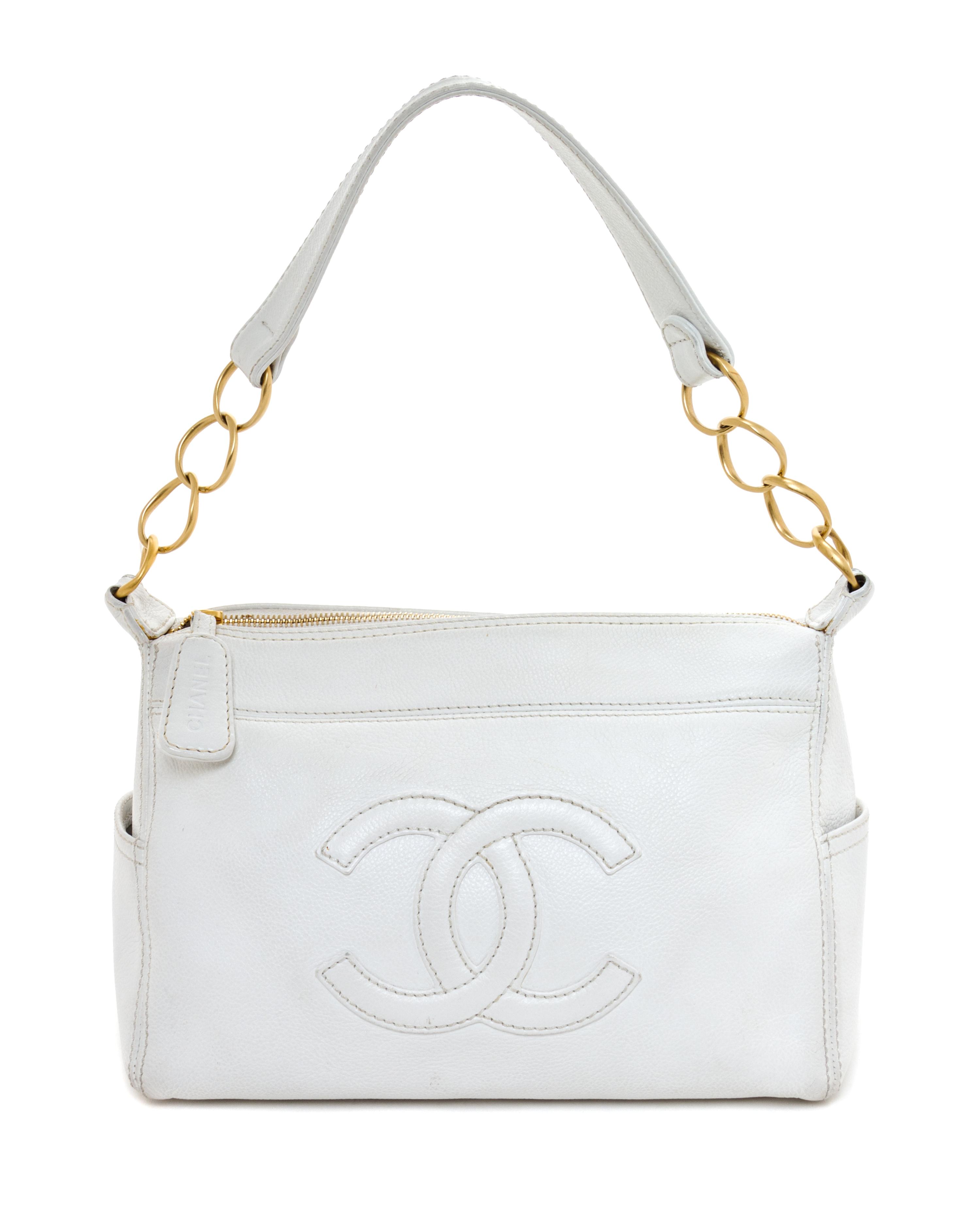 A Chanel White Caviar Leather Handbag, 14" x 8" x 5".