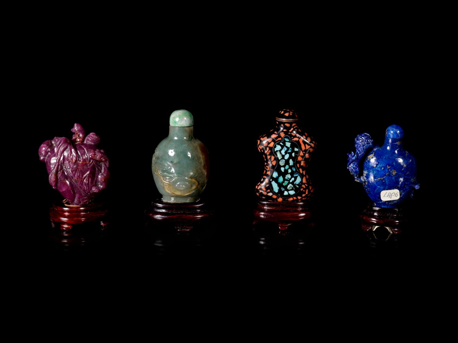 Nine Chinese Carved Hardstone Snuff Bottles