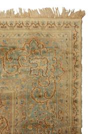 A Kirman Wool Rug — 20th Century