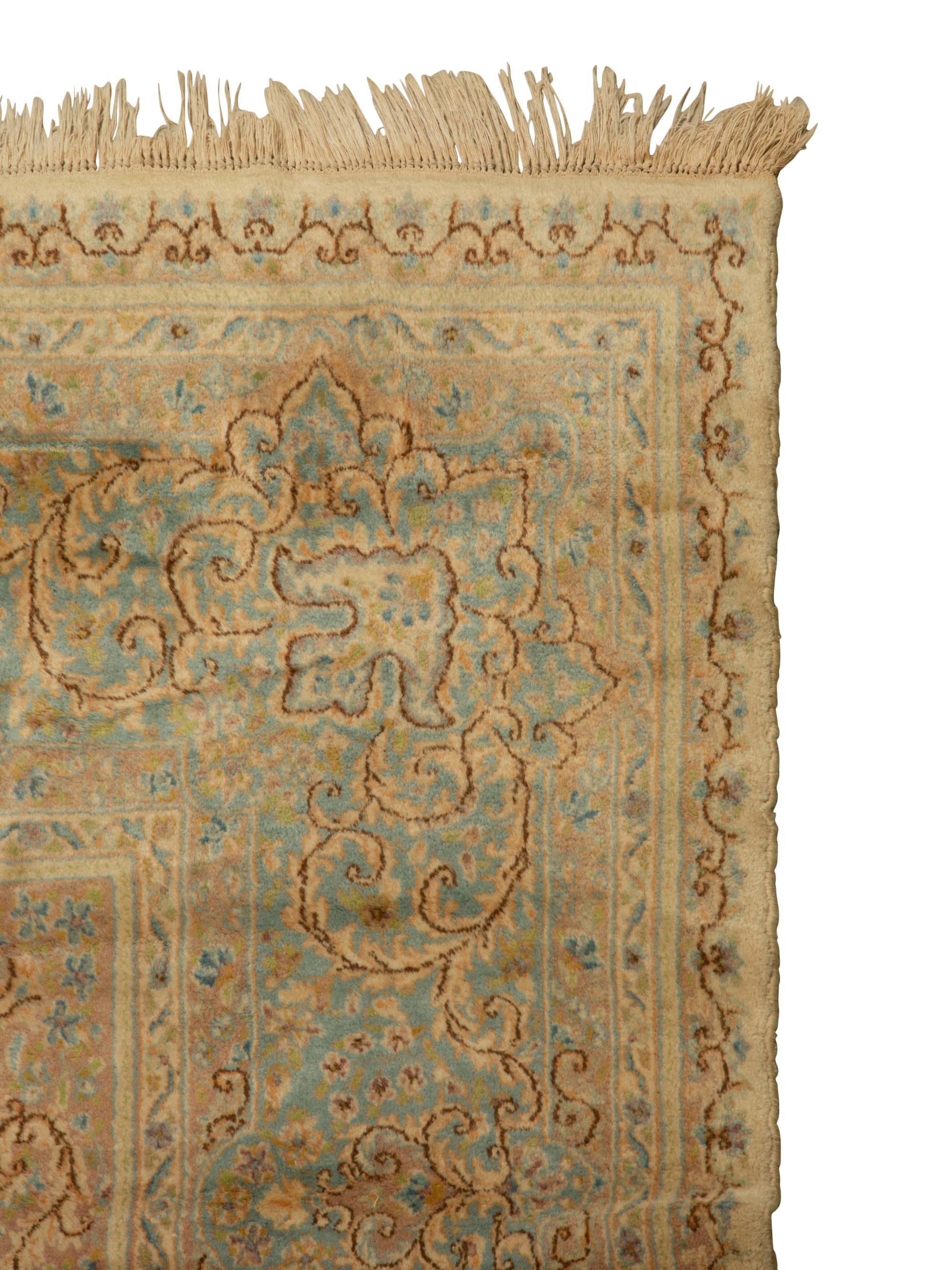 A Kirman Wool Rug — 20th Century