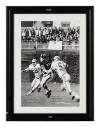 A Group of Seven Photographs Depicting Mike Ditka as a Player Formerly Displayed at Mike Ditka’s Restaurant