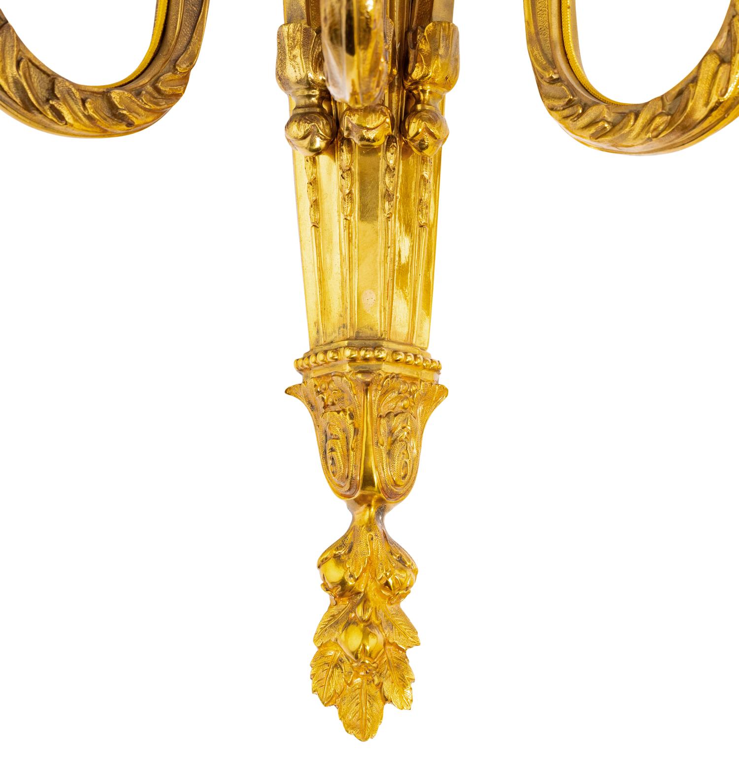 A Pair of Louis XVI Gilt Bronze Three-Light Sconces