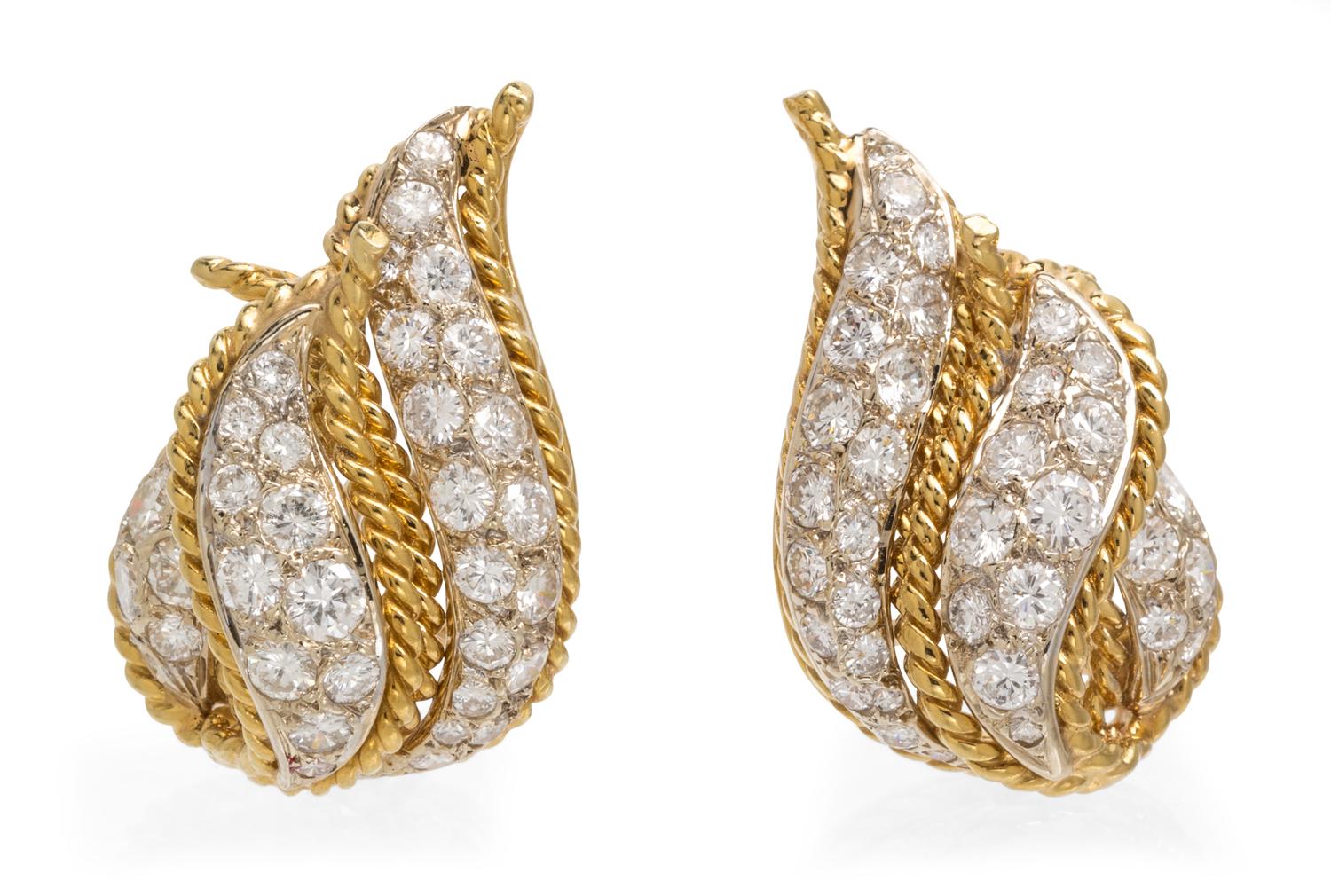A Pair of 18 Karat Gold and Diamond Earclips, 12.80 dwts.