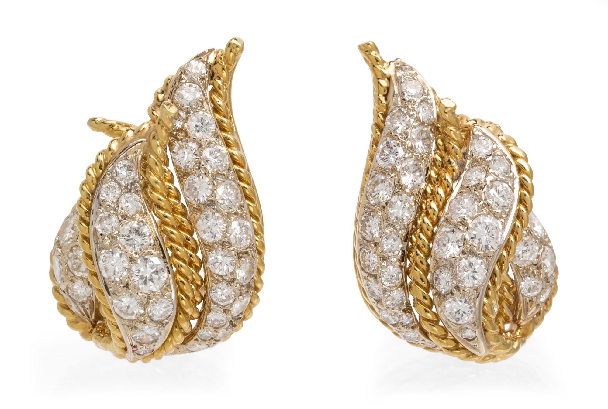 A Pair of 18 Karat Gold and Diamond Earclips, 12.80 dwts.