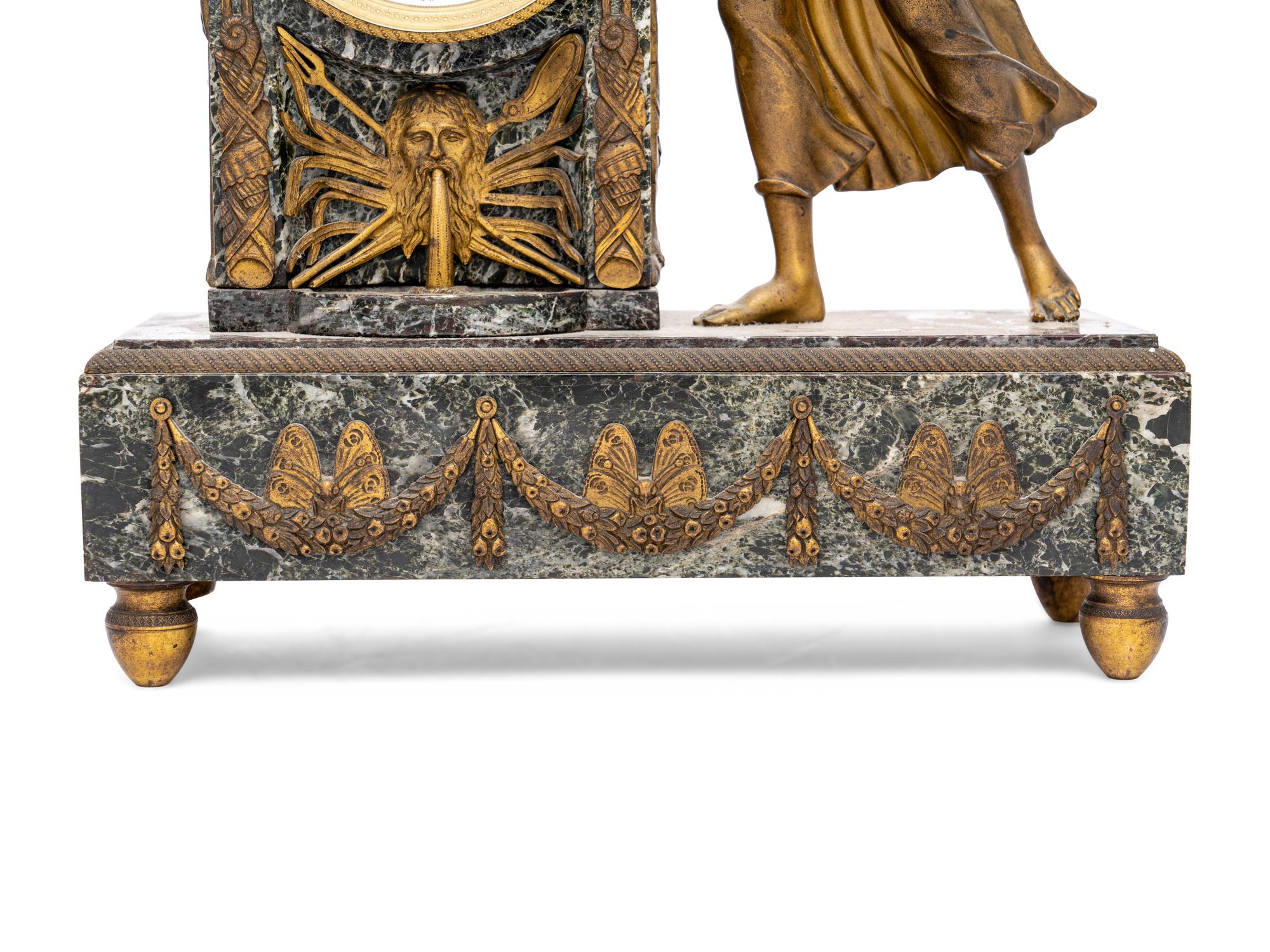 An Empire Style Gilt Metal and Marble Figural Mantel Clock