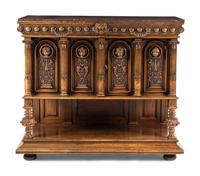 A Renaissance Revival Carved Walnut Marble-Top Cabinet
