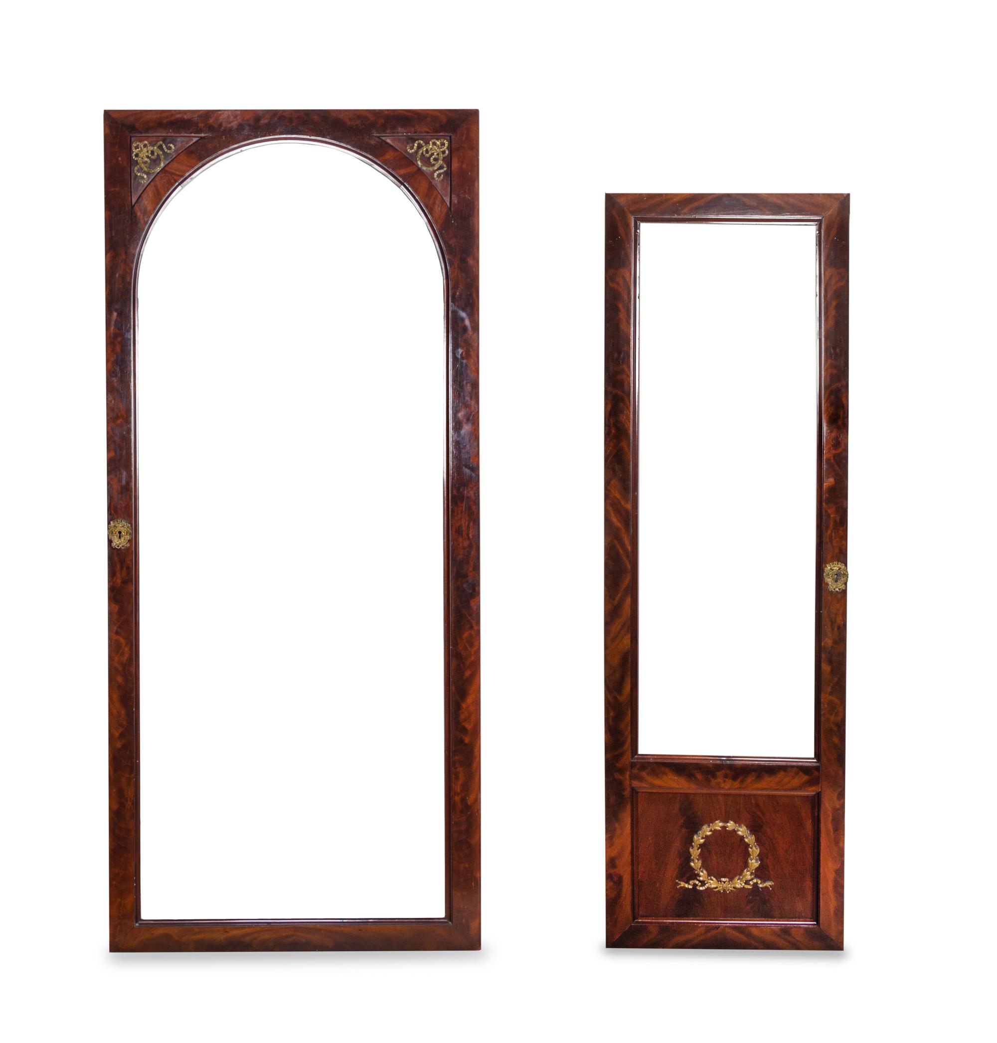 An Empire Style Gilt Metal Mounted Mahogany Breakfront Vitrine Cabinet