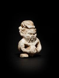 An Egyptian Glazed Steatite Amulet of Bes and Pataikos