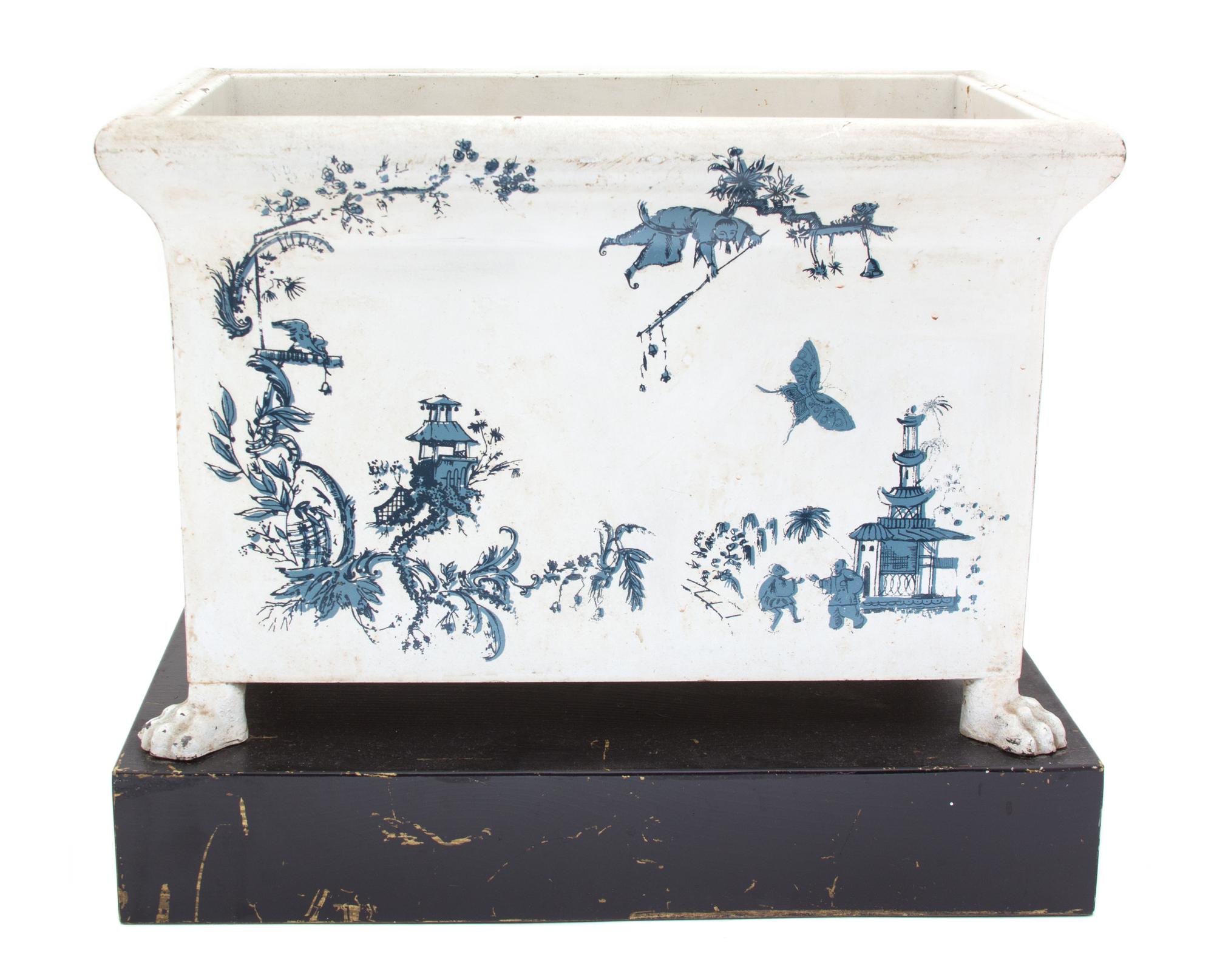 An English Painted Tole Jardiniere Height 11 x width 13 1/4 x depth 8 3/4 inches. — 19TH CENTURY