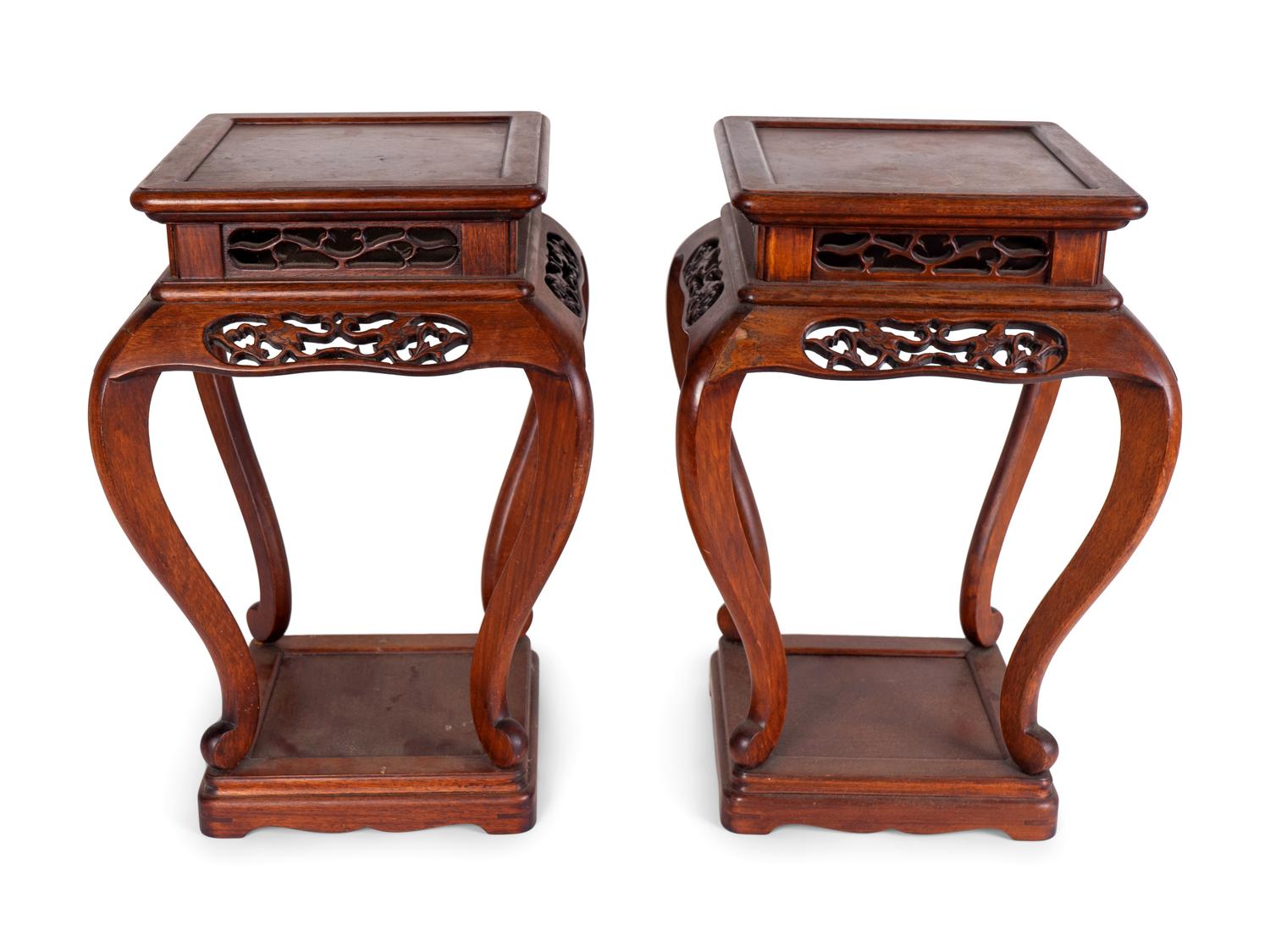 A Pair of Chinese Pierce-Carved Rosewood Stands