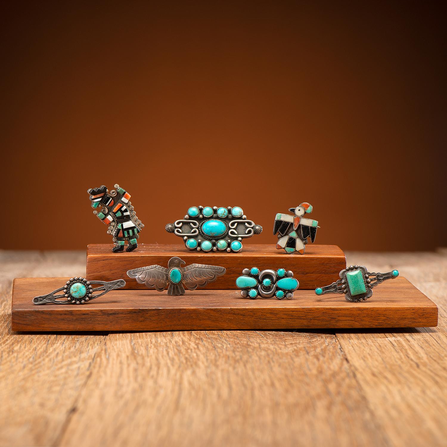 A Group of Navajo and Zuni Pins / Brooches