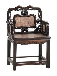 A Chinese Carved Hardwood Four-Piece Furniture Suite