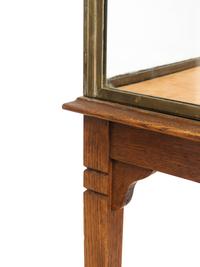 An A. Ravenel Parisian Brass and Glass Retailer's Window Vitrine on Oak Stand