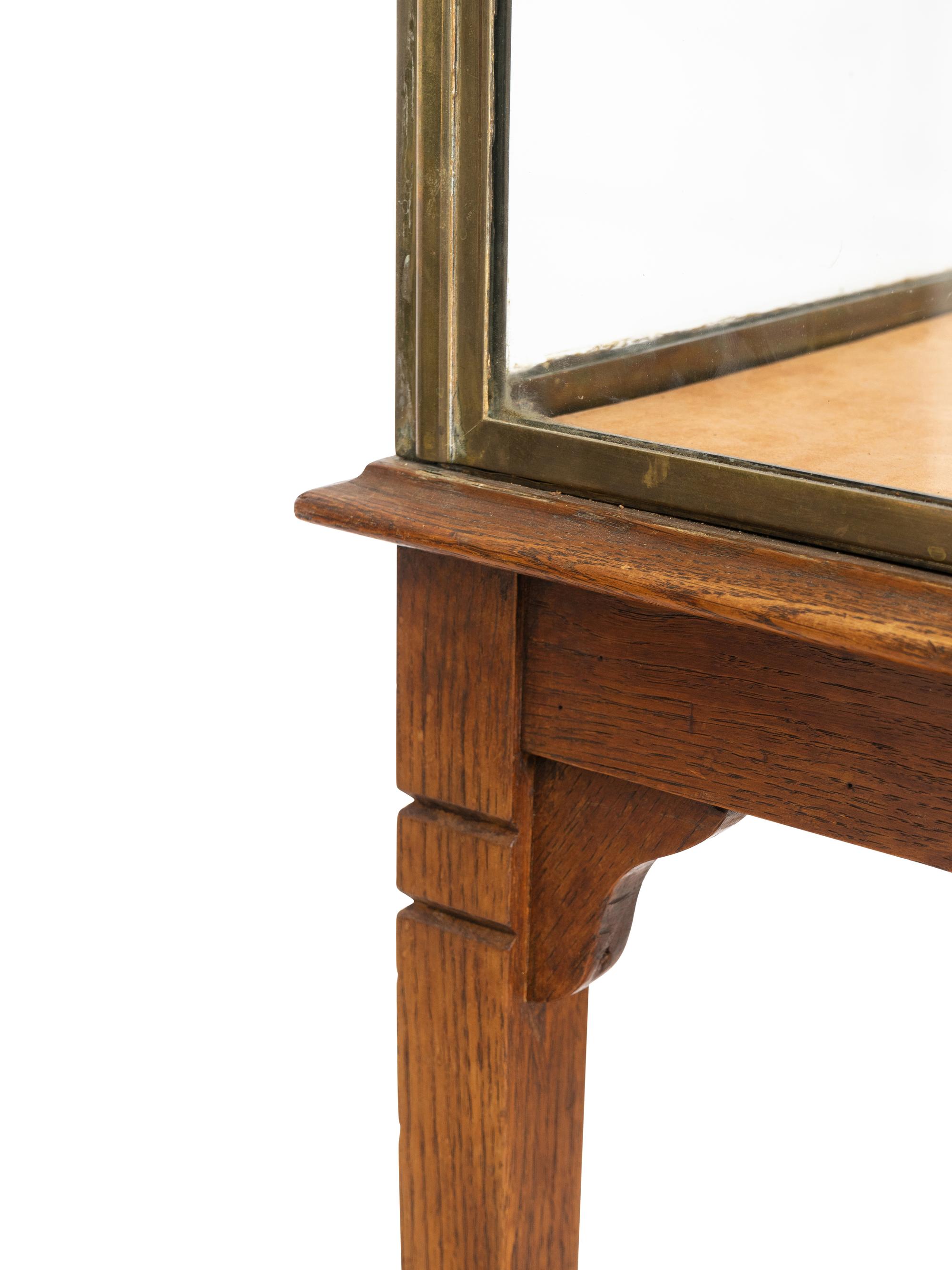 An A. Ravenel Parisian Brass and Glass Retailer's Window Vitrine on Oak Stand