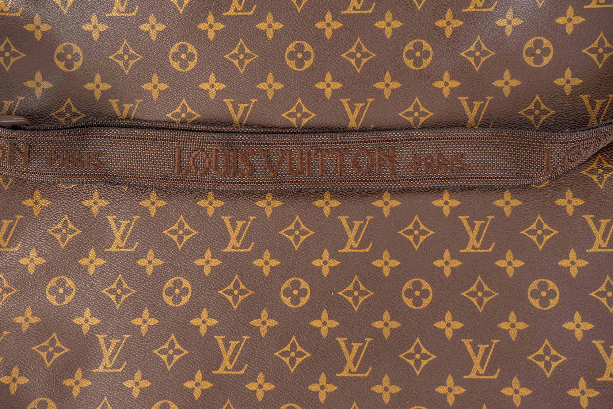 A Louis Vuitton Leather Garment Bag — 20TH CENTURY