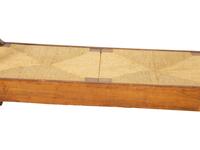 A Northern European Carved Walnut Bench with Rush Seat